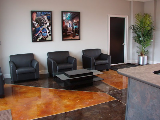 Custom corporate artwork, furniture, reception station, and silk tree