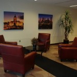 Corporate waiting lobby - furniture, canvas artwork, silk trees and arrangements