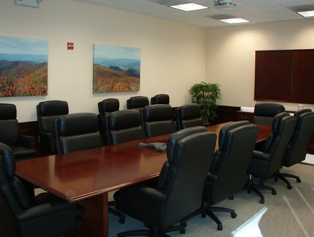 Completed project - canvas artwork, conference room furniture, & silk plants