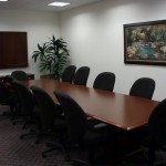 Completed project - artwork, conference room furniture, and silk tree